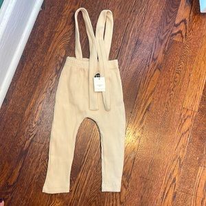 NWT unisex cream leggings with suspenders